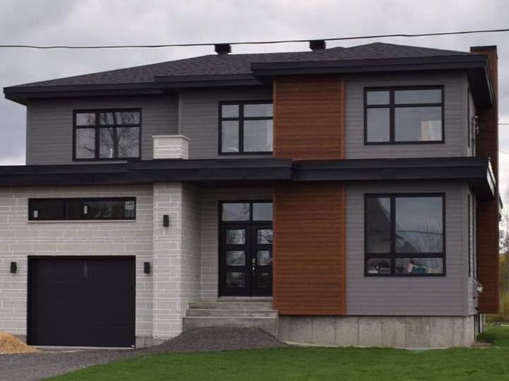 Revêtement bois maison Repentigny