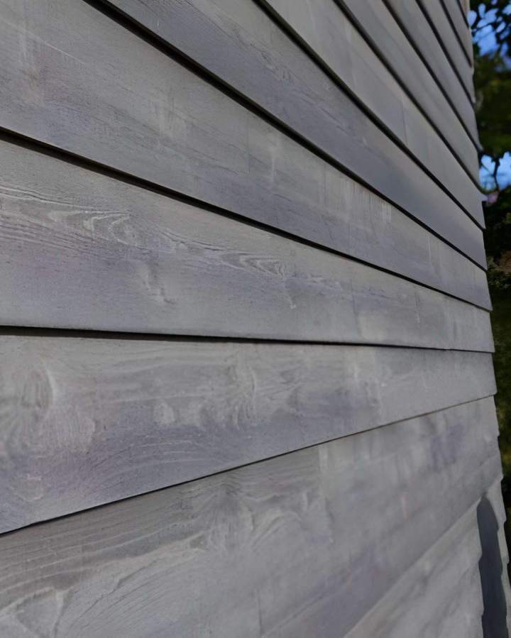 Bardage en bois, fibrociment, aluminium et panneaux architecturaux
